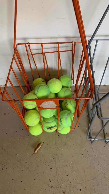 Photo 2 of TWO TENNIS BALL HOLDERS AND BALLS