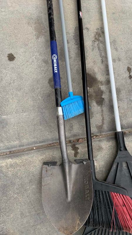 Photo 2 of KOBALT SHOVEL AND BROOMS AND A RAKE