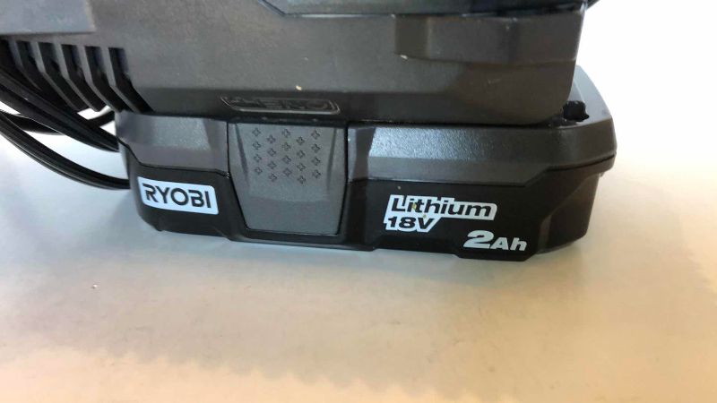 Photo 1 of RYOBI 18V BATTERY AND CHARGER