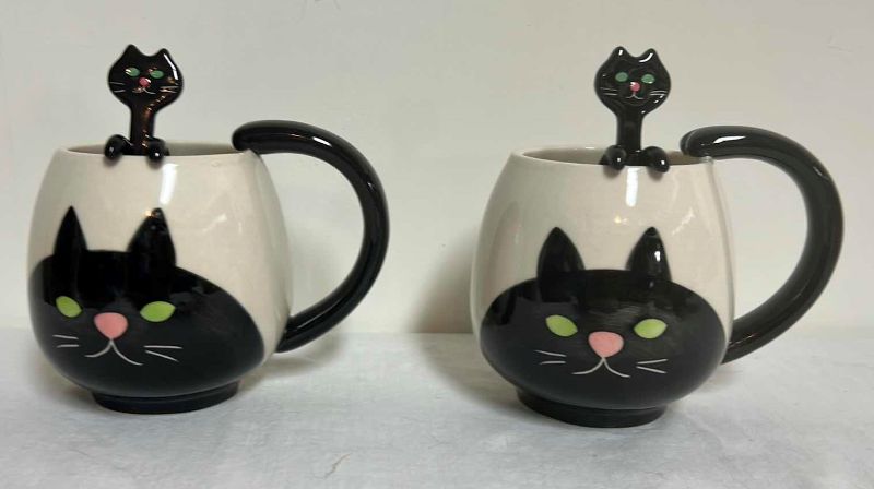 Photo 1 of TWO CAT MUGS WITH SPOONS