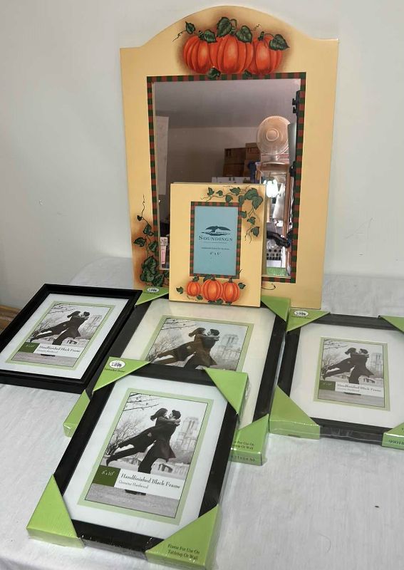 Photo 1 of PICTURE FRAME ASSORTMENT AND MIRROR