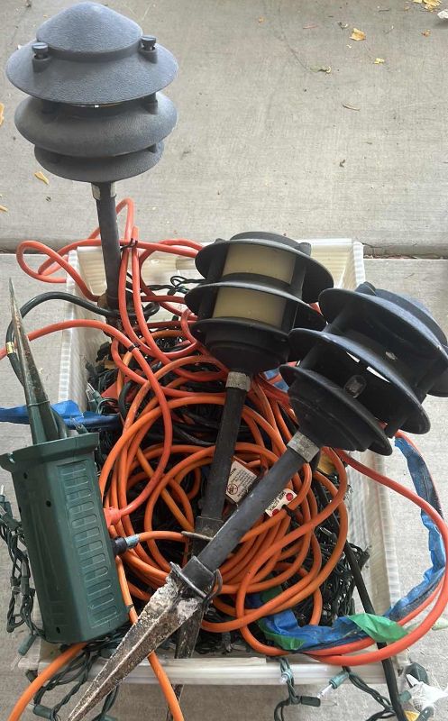 Photo 1 of BOX FULL OF ELECTRICAL CORDS AND OUTDOOR LIGHTING