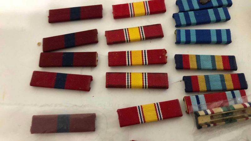 Photo 1 of ASSORTED MILITARY INSIGNIA