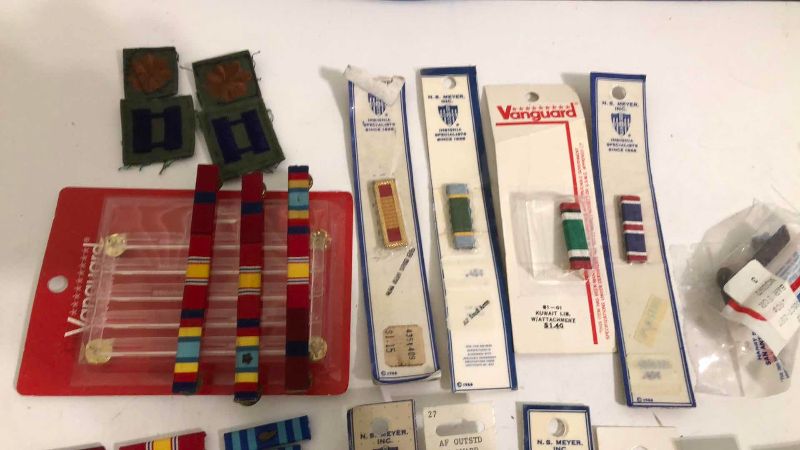 Photo 1 of ASSORTED MILITARY INSIGNIA