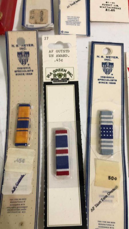 Photo 1 of ASSORTED MILITARY INSIGNIA