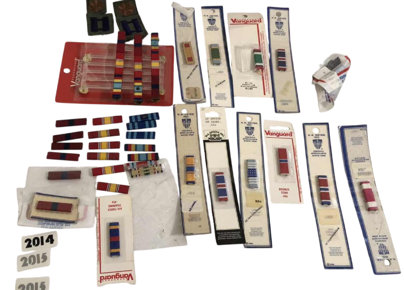 Photo 1 of ASSORTED MILITARY INSIGNIA