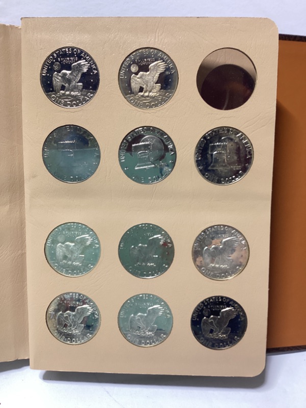 Photo 3 of UNCIRCULATED EISENHOWER DOLLAR COIN SET 1971-1978