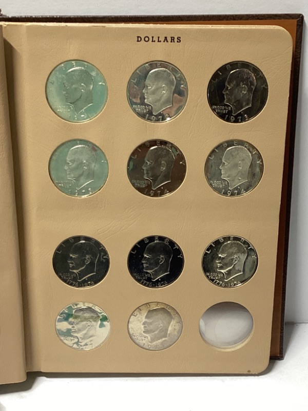 Photo 2 of UNCIRCULATED EISENHOWER DOLLAR COIN SET 1971-1978