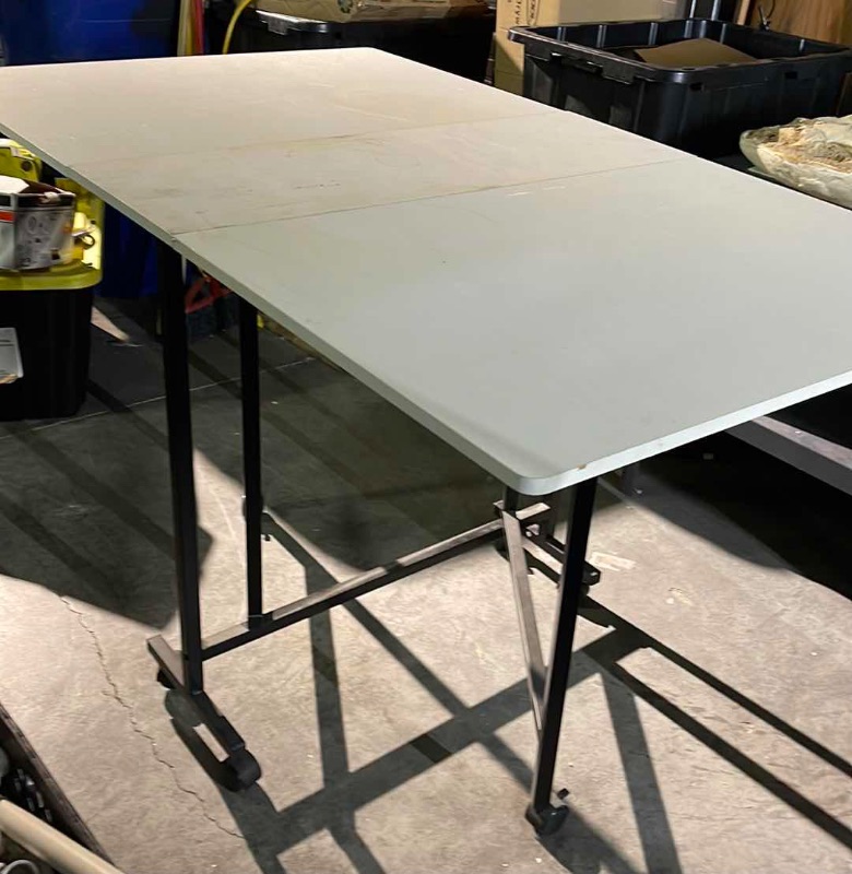 Photo 3 of ROLLING FOLDING TABLE