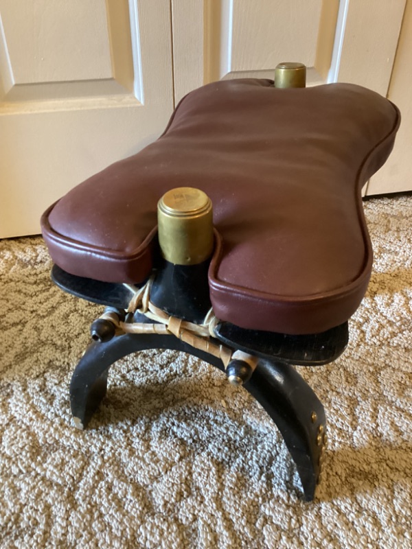 Photo 1 of VINTAGE CAMEL SADDLE FOOT STOOL WITH BRASS COVERED CAPS 19” X 11 X 14”