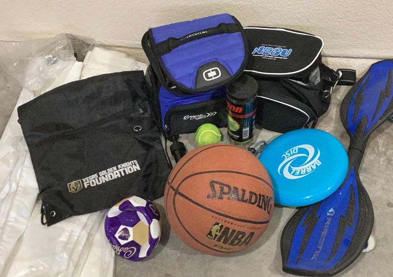 Photo 1 of BASKETBALL , TENNIS BALLS , RIP STICK AND MORE SPORTS STUFF 