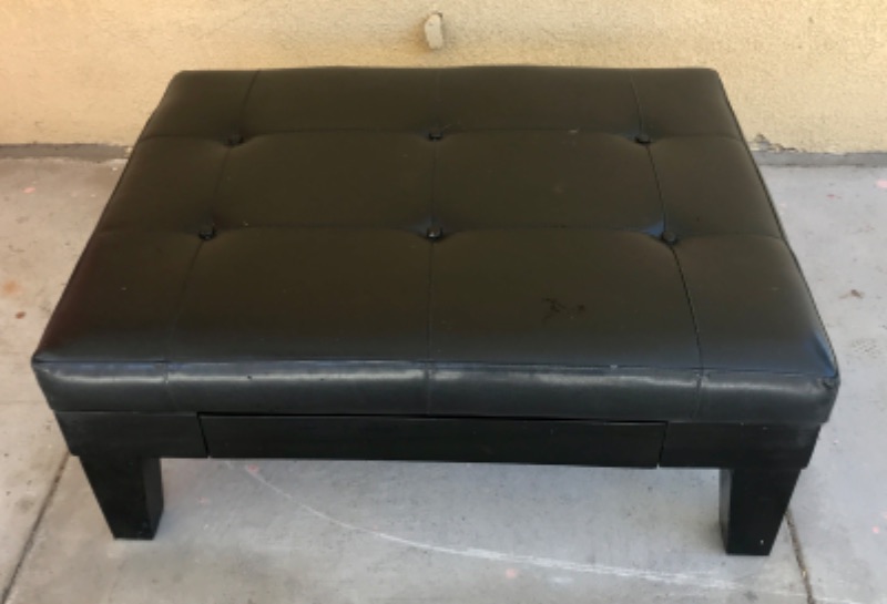 Photo 1 of BLACK LEATHER OTTOMAN W/ WOOD LEGS AND STORAGE DRAWER 40”x 30”x 17”