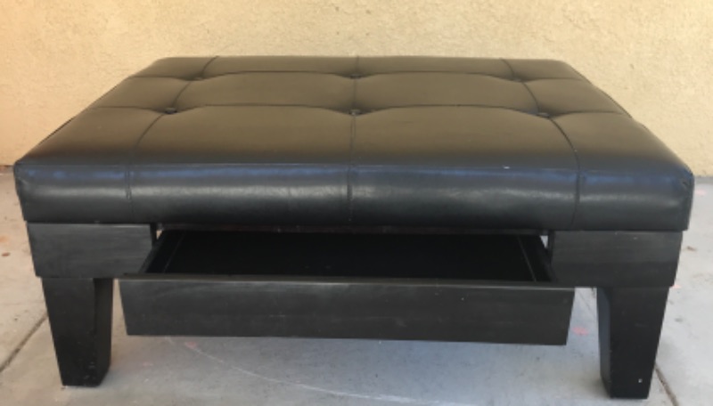 Photo 3 of BLACK LEATHER OTTOMAN W/ WOOD LEGS AND STORAGE DRAWER 40”x 30”x 17”