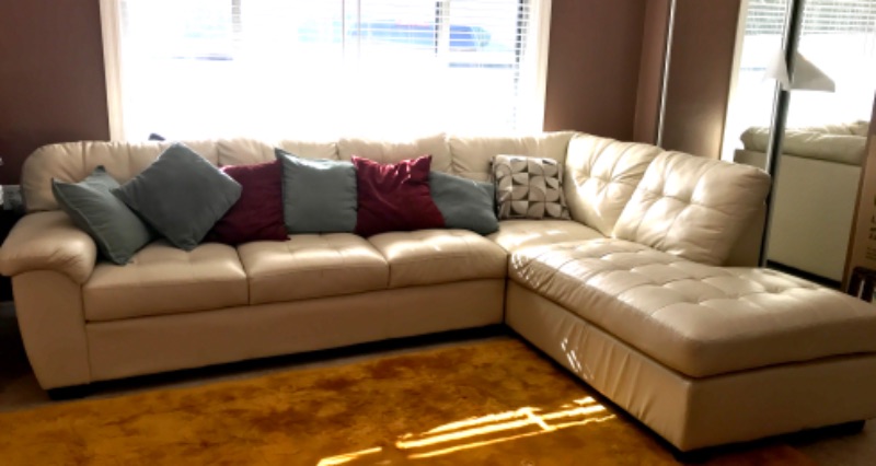 Photo 1 of CREAM LEATHER SECTIONAL SOFA 120”x 84”-HAS WEAR PLEASE SEE PHOTOS