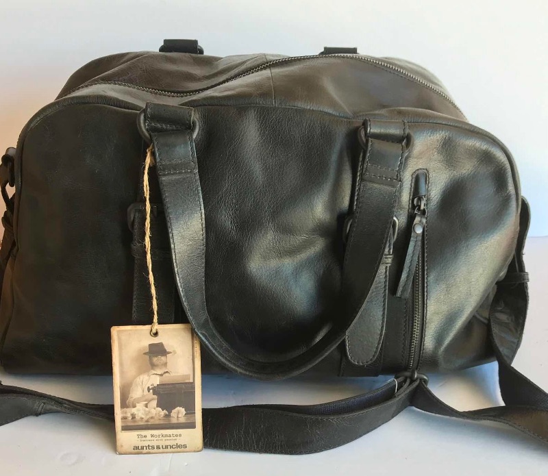 Photo 1 of AUNTS & UNCLE STRONGMAN LEATHER BAG W/ TAGS