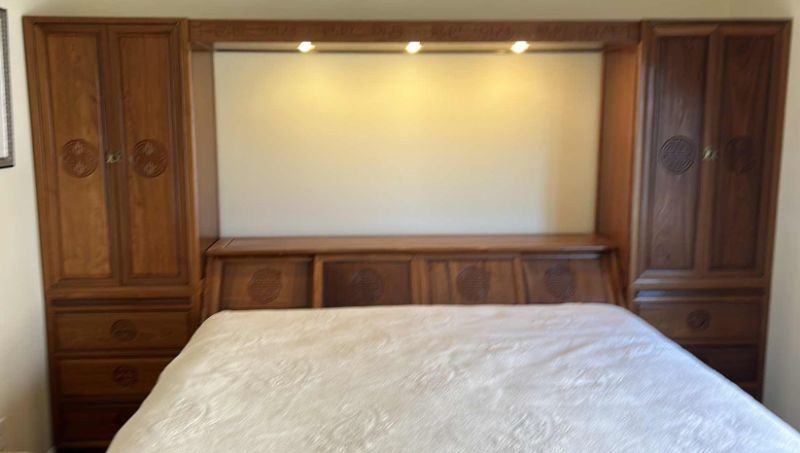 Photo 1 of ASIAN INSPIRED WOOD HEADBOARD AND WARDROBE 11’ x 20” x H 6’7” (MATTRESS SOLD SEPARATELY)