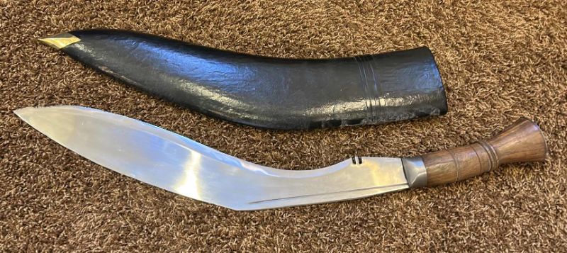 Photo 1 of MACHETE WITH LEATHER AND BRASS SHEATH 31.5” FROM TIP TO HANDLE (BLADE 23.5”)