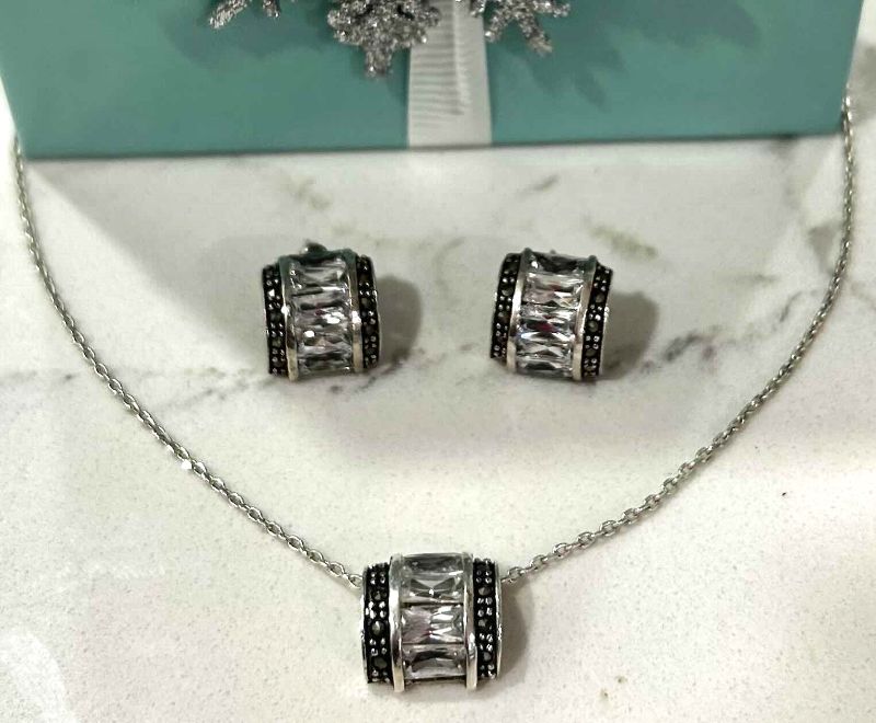 Photo 1 of FINE JEWELRY-.925 STERLING SILVER NECKLACE WITH ROLLER PENDANT MARCASITE AND CRYSTAL AND EARRINGS