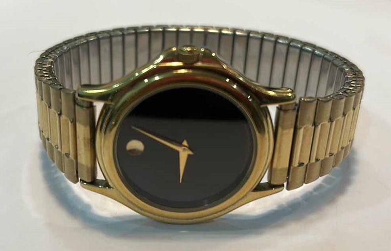 Photo 1 of MENS GOLD MOVADO WATCH (NEEDS BATTERY)