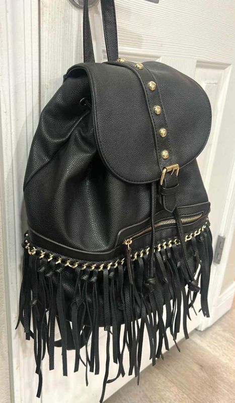 Photo 1 of BLACK BACKPACK PURSE WITH GOLD ACCENTS