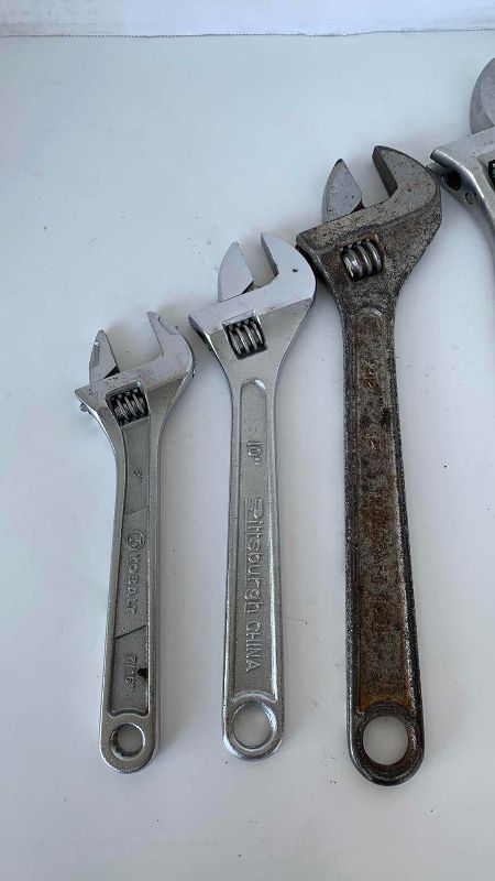 Photo 2 of 4 ADJUSTABLE WRENCHES 15”, 12”, 10” and 8”