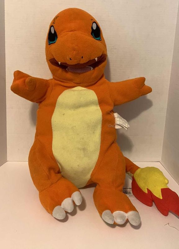 Photo 1 of POKÉMON CHARMANDER STUFFED ANIMAL 24”