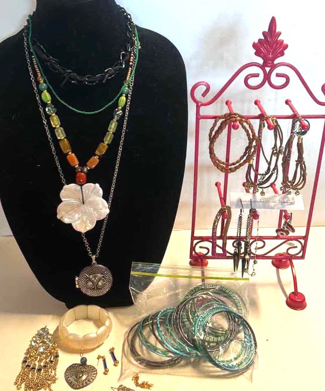 Photo 1 of JEWELRY ASSORTMENT WITH PINK STAND