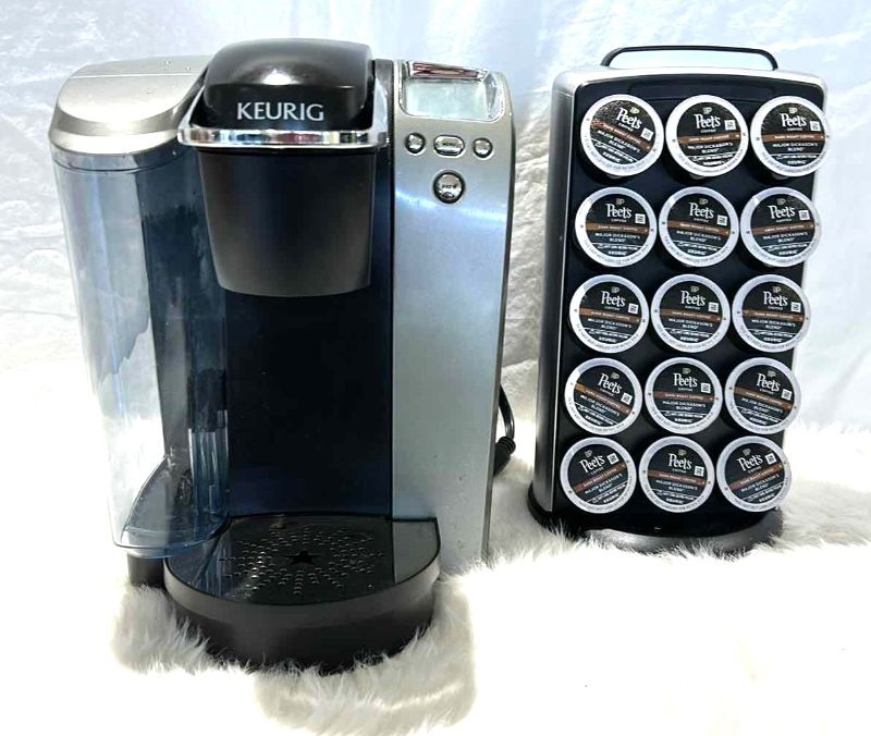 Photo 1 of KEURIG COFFEE MAKER AND POD HOLDER WITH PEETS COFFEE