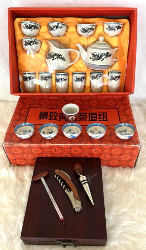 Photo 1 of NEW BOXED TEA SET, PORCELAIN TEACUPS AND WINE ACCESSORTIES