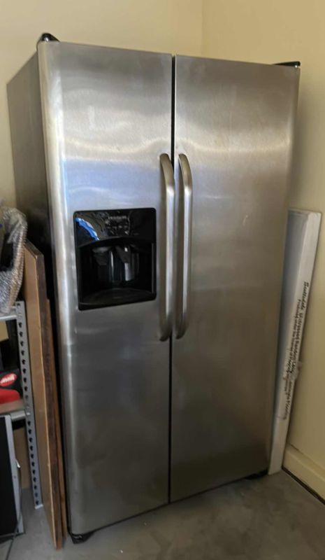 Photo 1 of SS FRIGIDAIRE SIDE BY SIDE REFRIGERATOR FREEZER