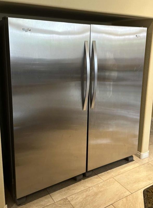 Photo 1 of SS WHIRLPOOL DOUBLE DOOR REFRIGERATOR FREEZER 5’ x 30” H66" (CONTENTS NOT INCLUDED)