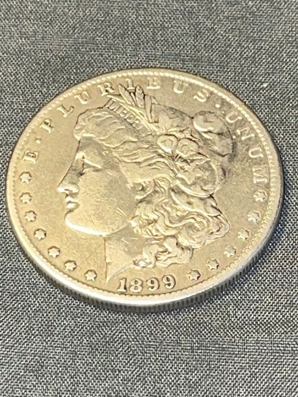 Photo 1 of 1899-O MORGAN SILVER DOLLAR