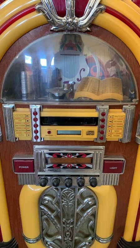 Photo 3 of ELECTRONIC JUKEBOX WITH RADIO AND DISC SLOT 22” X 11” H 39”