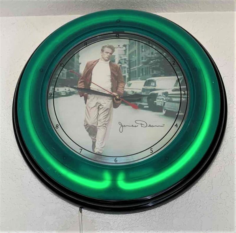 Photo 1 of COLLECTIBLE VINTAGE JAMES DEAN LIGHT UP CLOCK, 25” ROUND