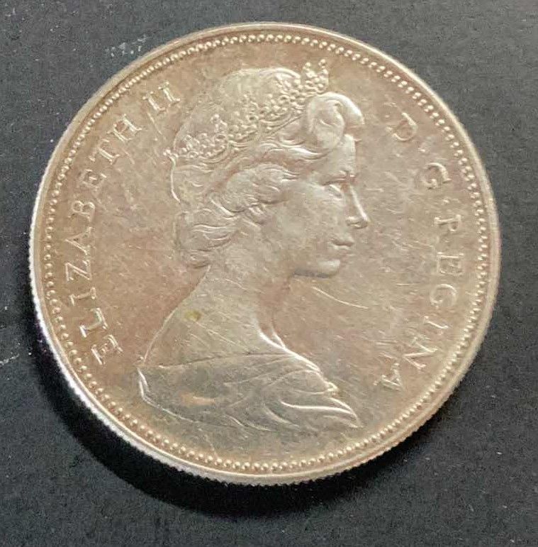 Photo 1 of CANADIAN 1867-1967 ONE DOLLAR COIN