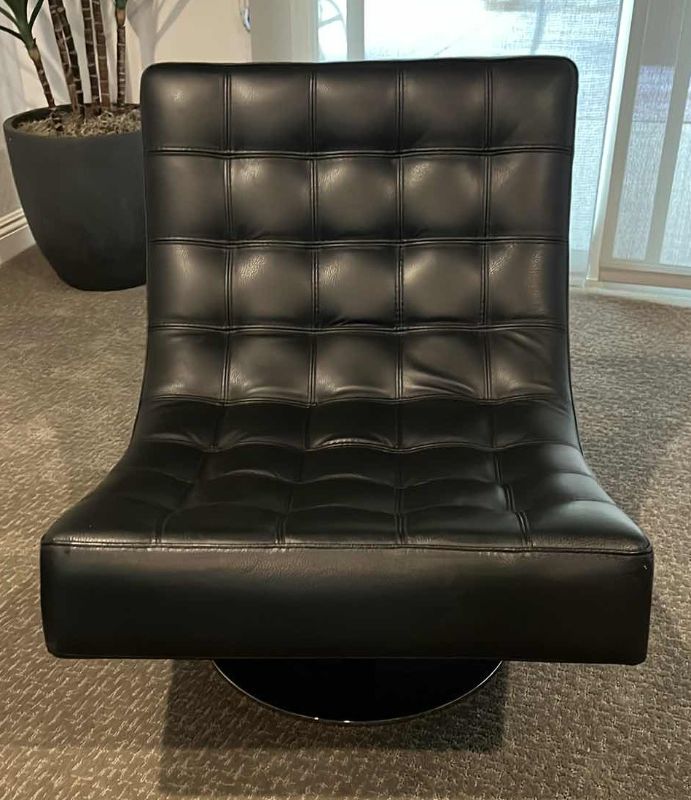 Photo 2 of ROCHE BOBLOIS BLACK LEATHER SWIVEL ARMLESS CHAIR W POLISHED STAINLESS-STEEL BASE