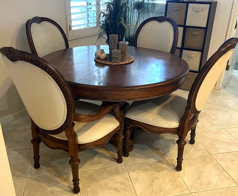 Photo 2 of HEAVY CARVED WALNUT WOOD 48" ROUND DINING TABLE W. 2 ARM CHAIRS & 2 SIDE CHAIRS-INCLUDES 2-12" WIDE TABLE EXTENSIONS (FULLY EXTENDED TO 72")-OFF WHITE PADDED FABRIC CHAIRS