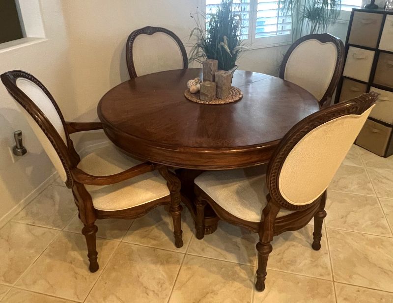 Photo 3 of HEAVY CARVED WALNUT WOOD 48" ROUND DINING TABLE W. 2 ARM CHAIRS & 2 SIDE CHAIRS-INCLUDES 2-12" WIDE TABLE EXTENSIONS (FULLY EXTENDED TO 72")-OFF WHITE PADDED FABRIC CHAIRS