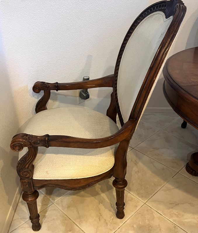 Photo 5 of HEAVY CARVED WALNUT WOOD 48" ROUND DINING TABLE W. 2 ARM CHAIRS & 2 SIDE CHAIRS-INCLUDES 2-12" WIDE TABLE EXTENSIONS (FULLY EXTENDED TO 72")-OFF WHITE PADDED FABRIC CHAIRS