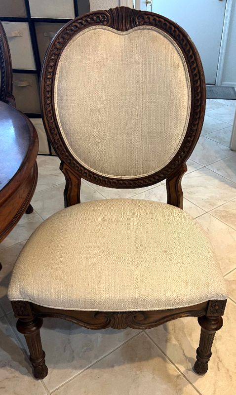 Photo 6 of HEAVY CARVED WALNUT WOOD 48" ROUND DINING TABLE W. 2 ARM CHAIRS & 2 SIDE CHAIRS-INCLUDES 2-12" WIDE TABLE EXTENSIONS (FULLY EXTENDED TO 72")-OFF WHITE PADDED FABRIC CHAIRS