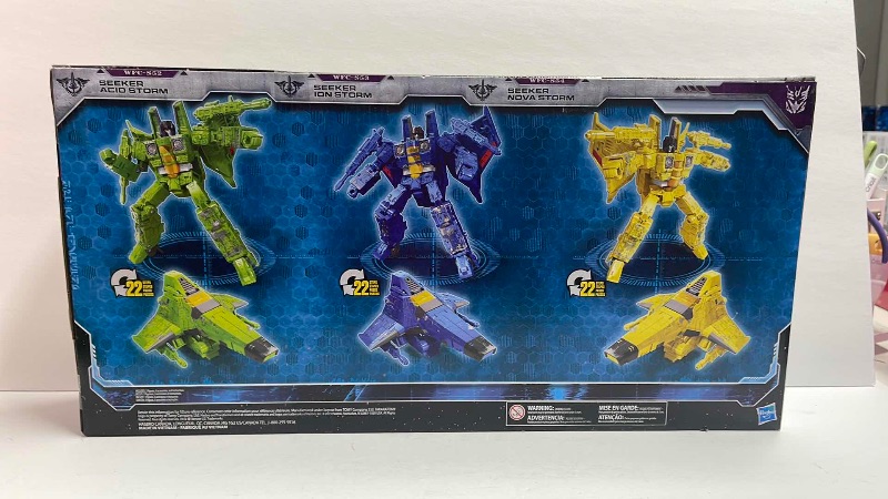 Photo 2 of NIB TRANSFORMERS WAR FOR CYBERTRON SIEGE VOYAGER CLASS SEEKERS ACID STORM, ION STORM, & NOVA STORM THREE-PACK- RETAIL PRICE $94.99