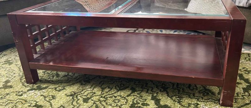 Photo 2 of GLASS AND WOOD COFFEE TABLE - 48” x 26” x 18”