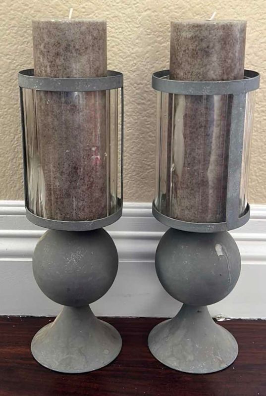 Photo 1 of TWO METAL AND GLASS CANDLE HOLDERS WITH CANDLES