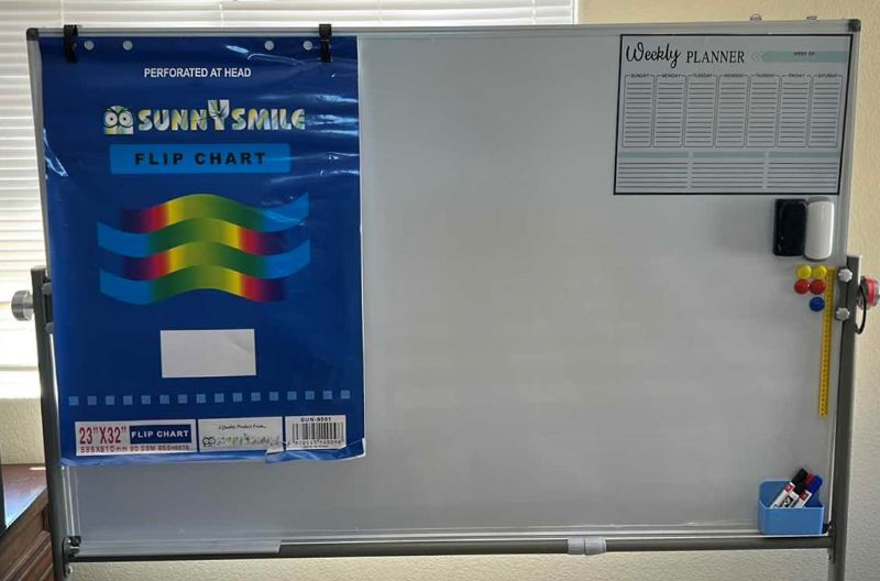 Photo 1 of ROLLING DOUBLE SIDED WHITEBOARD -60”W x 65”H