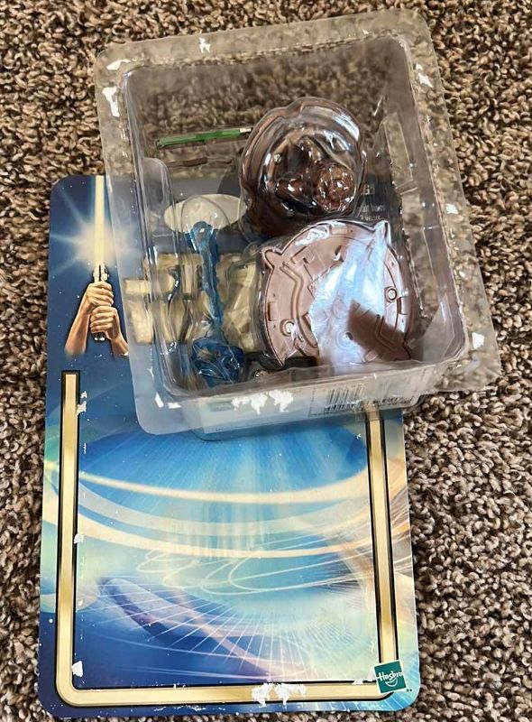 Photo 3 of VINTAGE STARWARS COLLECTIBLE FIGURINE - DAMAGED PACKAGING
