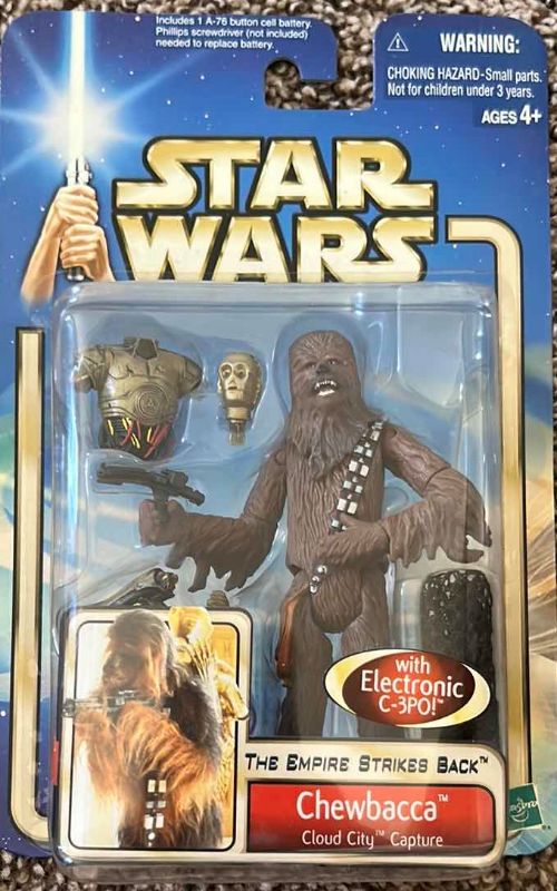 Photo 1 of VINTAGE STAR WARS COLLECTIBLE FIGURINE 
