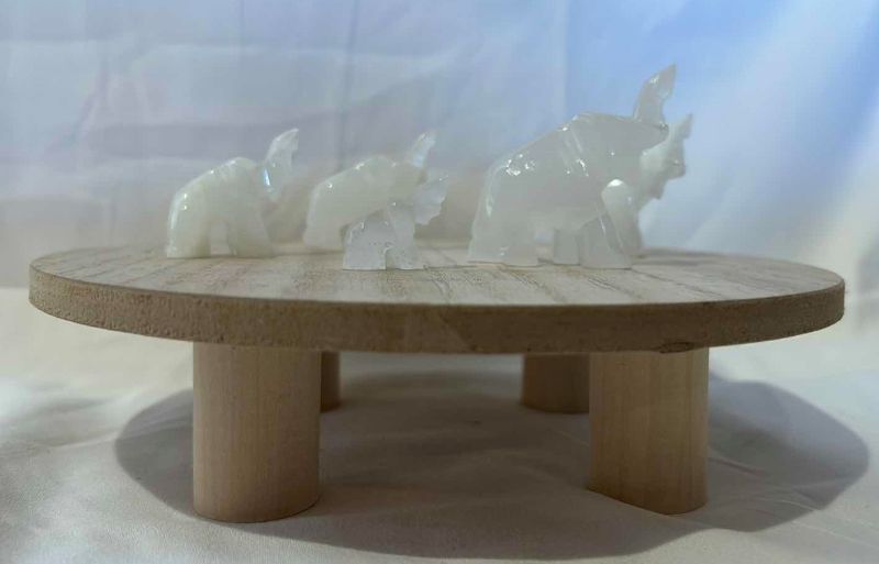 Photo 1 of 5 STONE CARVED ELEPHANTS ON WOOD STAND