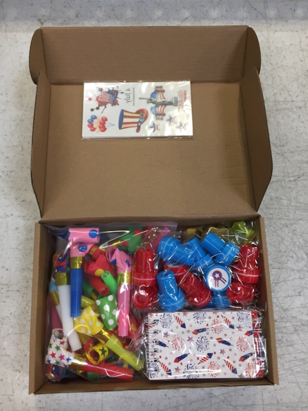 Photo 2 of 96 Pcs 4th of July Party Favor Supplies Independence Day Patriotic Goodie Bags Notebook Pencil Tattoo Stickers Pencil Sharpener Stamper Blower for 4th of July Classroom Game Prizes Party Fillers