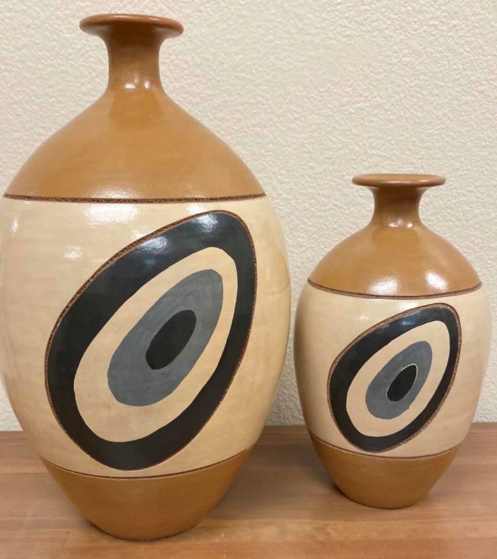 Photo 1 of PAIR OF POTTERY VASES MADE IN NICARAGUA TALLEST 24”