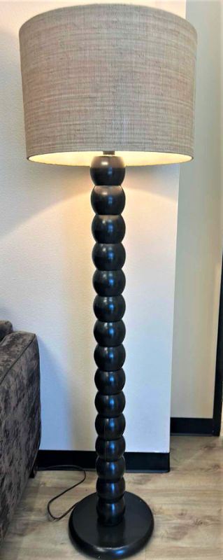 Photo 1 of BLACK WOOD FLOOR LAMP WITH ROUGH LINEN SHADE H67”